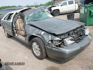 2004 Mercury Grand Marquis LS Premium z VIN 2MEFM75W24X635442, wystawiony jako IAAI lot #42400003 z przebiegiem Nie podano mil oraz . Historia ofert i sprzedaży dostępna na DreamBid. Obrazek 1.