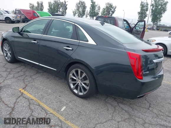 2013 Cadillac XTS Luxury with VIN 2G61P5S33D9215214, listed as a IAAI auction lot 42170402 with 132,045 mi miles and . Bid and sale history available at DreamBid. Image 3.