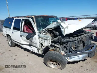 1996 GMC Suburban with VIN 1GDEC16R8TJ738647, listed as a IAAI auction lot 41688543 with 216,078 mi miles. Bid and sale history available at carsss.com. Image 1.