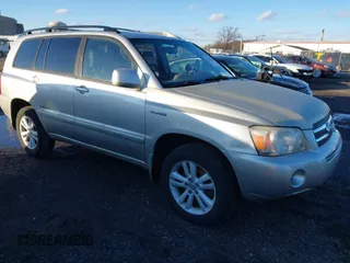 2007 Toyota Highlander Hybrid w/3rd Row with VIN JTEEW21AX70039370, listed as a IAAI auction lot 41601611 with 219,833 mi miles. Bid and sale history available at carsss.com. Image 1.