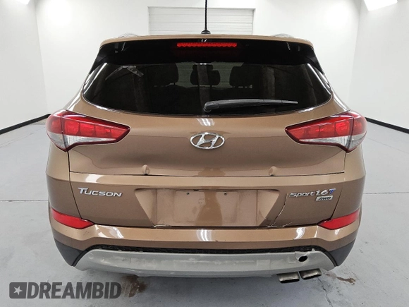2017 Hyundai Tucson Sport z VIN KM8J3CA22HU415298, wystawiony jako Copart lot #57496495 z przebiegiem 67 475 mil mil oraz Czysty tytuł • Clean title. Historia ofert i sprzedaży dostępna na DreamBid. Obrazek 6.