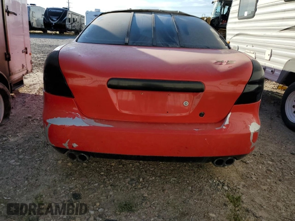 2004 Pontiac Grand Prix GTP with VIN 2G2WR524641296718, listed as a Copart auction lot 73435344 with 69,113 mi miles and Salvage Title. Bid and sale history available at carsss.com. Image 6.