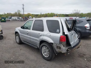 2005 Mercury Mariner Convenience z VIN 4M2YU57Z55DJ18600, wystawiony jako IAAI lot #42082068 z przebiegiem 141 530 mil mil oraz . Historia ofert i sprzedaży dostępna na DreamBid. Obrazek 3.