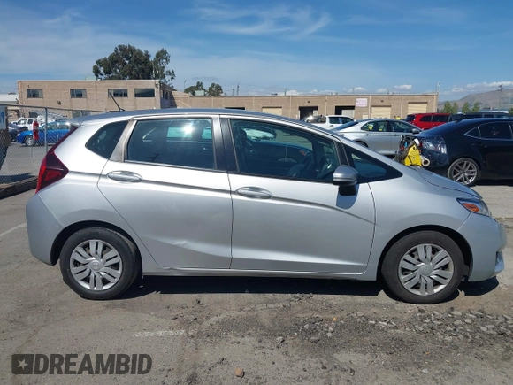 2015 Honda Fit LX z VIN 3HGGK5H51FM750102, wystawiony jako IAAI lot #42278830 z przebiegiem 121 855 mil mil oraz . Historia ofert i sprzedaży dostępna na DreamBid. Obrazek 13.