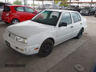 1998 Volkswagen Jetta z VIN 3VWRB81H5WM156431, wystawiony jako IAAI lot #42042282 z przebiegiem 92 995 mil mil oraz . Historia ofert i sprzedaży dostępna na DreamBid. Obrazek 2.