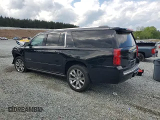 2015 Chevrolet Suburban LTZ with VIN 1GNSKKKC4FR119803, listed as a Copart auction lot 51416775 with 135,366 mi miles and Salvage Title. Bid and sale history available at DreamBid. Image 2.