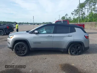 2018 Jeep Compass Latitude with VIN 3C4NJDBBXJT402489, listed as a IAAI auction lot 42369108 with 126,939 mi miles and . Bid and sale history available at DreamBid. Image 14.