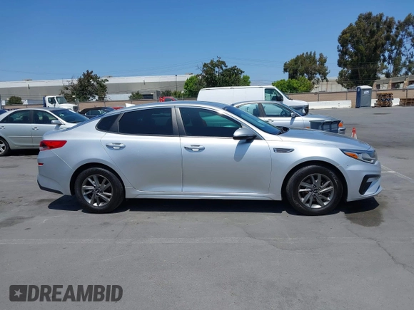 2019 Kia Optima LX z VIN 5XXGT4L34KG340899, wystawiony jako IAAI lot #42445116 z przebiegiem 118 188 mil mil oraz . Historia ofert i sprzedaży dostępna na DreamBid. Obrazek 13.