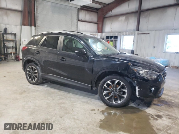 2016 Mazda CX-5 Grand Touring with VIN JM3KE4DY6G0655802, listed as a Copart auction lot 43820475 with 76,639 mi miles and Salvage Title. Bid and sale history available at carsss.com. Image 4.