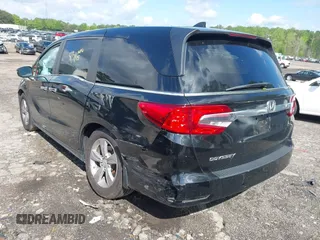 2018 Honda Odyssey EX-L with VIN 5FNRL6H75JB065206, listed as a IAAI auction lot 42009227 with 133,652 mi miles. Bid and sale history available at carsss.com. Image 3.