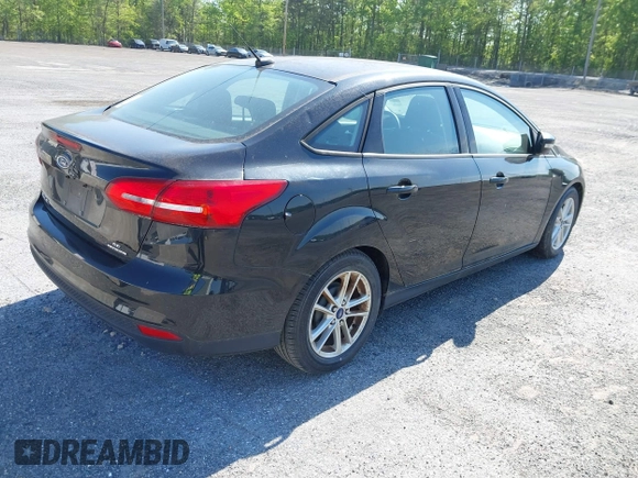 2015 Ford Focus SE with VIN 1FADP3F28FL204176, listed as a IAAI auction lot 42132656 with Not Provided miles. Bid and sale history available at carsss.com. Image 4.