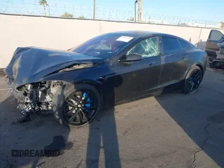 2022 Tesla Model S with VIN 5YJSA1E57NF493457, listed as a IAAI auction lot 41456284 with Not Provided miles and . Bid and sale history available at DreamBid. Image 21.