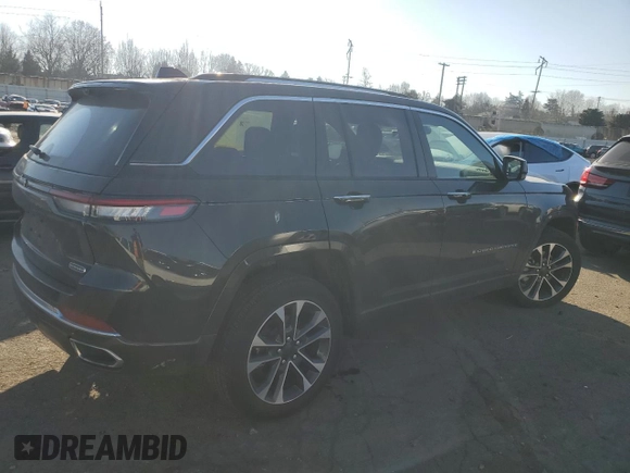 2023 Jeep Grand Cherokee Overland with VIN 1C4RJHDG4P8847576, listed as a Copart auction lot 42959755 with 21,464 mi miles and Salvage title. Bid and sale history available at DreamBid. Image 3.