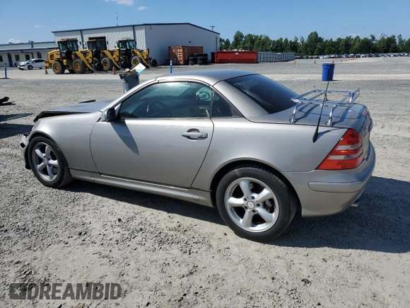 2003 Mercedes-Benz SLK 320 with VIN WDBKK65F03F286130, listed as a Copart auction lot 61544385 with 98,899 mi miles and Salvage title. Bid and sale history available at DreamBid. Image 2.