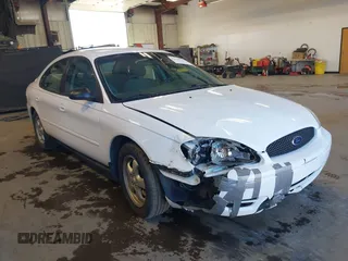 2005 Ford Taurus SE z VIN 1FAFP53U25A227893, wystawiony jako IAAI lot #42148111 z przebiegiem 141 440 mil mil oraz . Historia ofert i sprzedaży dostępna na DreamBid. Obrazek 1.