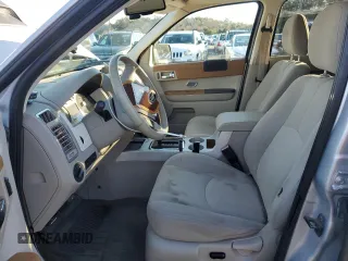 2008 Mercury Mariner with VIN 4M2CU29H28KJ26862, listed as a Copart auction lot 86907864 with 127,249 mi miles and Salvage Title. Bid and sale history available at carsss.com. Image 7.