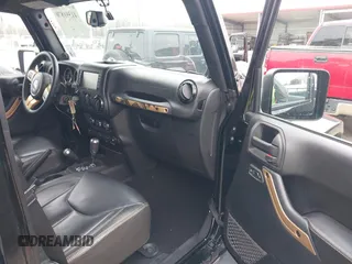 2014 Jeep Wrangler Unlimited Sahara with VIN 1C4HJWEG1EL202974, listed as a IAAI auction lot 41591870 with 17,174 mi miles. Bid and sale history available at carsss.com. Image 5.