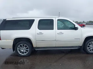 2011 GMC Yukon XL Denali z VIN 1GKS2MEF5BR178383, wystawiony jako IAAI lot #42331419 z przebiegiem 247 193 mil mil oraz . Historia ofert i sprzedaży dostępna na DreamBid. Obrazek 14.