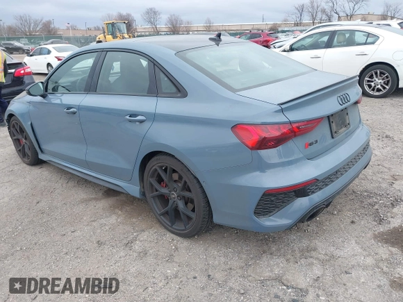 2023 Audi RS 3 with VIN WUAG4DGY9PA905303, listed as a IAAI auction lot 41728962 with 16,896 mi miles. Bid and sale history available at carsss.com. Image 3.