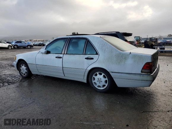 1996 Mercedes-Benz S 320 with VIN WDBGA32EXTA286877, listed as a Copart auction lot 86838274 with 149,870 mi miles and Clean Title. Bid and sale history available at DreamBid. Image 2.