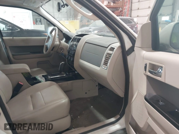 2009 Ford Escape Hybrid z VIN 1FMCU59329KB01081, wystawiony jako IAAI lot #42557114 z przebiegiem 206 972 mil mil oraz . Historia ofert i sprzedaży dostępna na DreamBid. Obrazek 5.