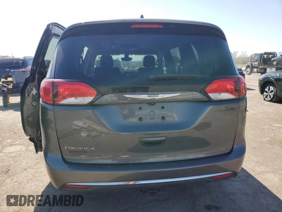 2017 Chrysler Pacifica Touring L with VIN 2C4RC1BG0HR770361, listed as a Copart auction lot 53789715 with 99,685 mi miles and Salvage Title. Bid and sale history available at DreamBid. Image 6.