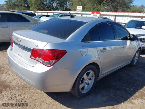2014 Chevrolet Cruze 1LT with VIN 1G1PC5SB5E7102581, listed as a IAAI auction lot 41461129 with 65,405 mi miles. Bid and sale history available at carsss.com. Image 4.