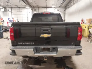 2014 Chevrolet Silverado 1500 LT with VIN 1GCVKREH2EZ225509, listed as a IAAI auction lot 41728865 with 257,709 mi miles and . Bid and sale history available at DreamBid. Image 16.