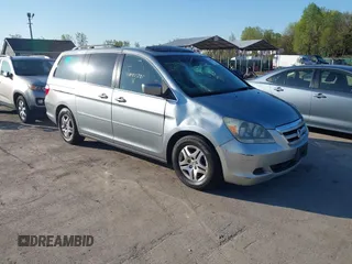 2007 Honda Odyssey EX-L with VIN 5FNRL387X7B140294, listed as a IAAI auction lot 41995795 with 202,934 mi miles. Bid and sale history available at carsss.com. Image 1.