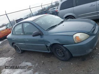 2003 Kia Rio with VIN KNADC125336231562, listed as a IAAI auction lot 41386659 with 87,965 mi miles. Bid and sale history available at carsss.com. Image 13.