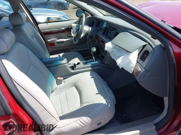 2002 Mercury Grand Marquis LS Premium z VIN 2MEFM75W22X653775, wystawiony jako IAAI lot #42225138 z przebiegiem 124 749 mil mil oraz . Historia ofert i sprzedaży dostępna na DreamBid. Obrazek 5.