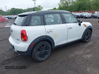 2013 MINI Countryman with VIN WMWZB3C53DWM08244, listed as a IAAI auction lot 42281364 with 139,894 mi miles and . Bid and sale history available at DreamBid. Image 4.