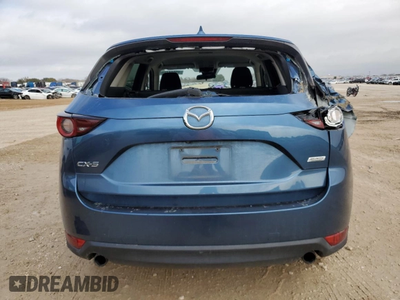 2017 Mazda CX-5 Sport with VIN JM3KFABL1H0116055, listed as a Copart auction lot 45044725 with 100,901 mi miles and Salvage Title. Bid and sale history available at carsss.com. Image 6.