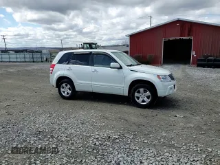 2012 Suzuki Grand Vitara Premium z VIN JS3TD0D66C4100845, wystawiony jako Copart lot #53454565 z przebiegiem 106 415 mil mil oraz Szkoda całkowita • Salvage title. Historia ofert i sprzedaży dostępna na DreamBid. Obrazek 14.
