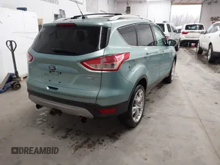 2013 Ford Escape Titanium with VIN 1FMCU9J9XDUC60029, listed as a IAAI auction lot 41936948 with 184,012 mi miles and . Bid and sale history available at DreamBid. Image 4.