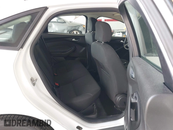 2017 Ford Focus SE with VIN 1FADP3F2XHL342823, listed as a IAAI auction lot 42496940 with 97,263 mi miles and . Bid and sale history available at DreamBid. Image 8.