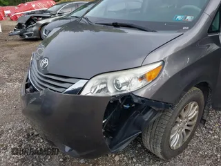 2012 Toyota Sienna XLE AAS z VIN 5TDYK3DC5CS224787, wystawiony jako IAAI lot #42519653 z przebiegiem 139 062 mil mil oraz . Historia ofert i sprzedaży dostępna na DreamBid. Obrazek 6.