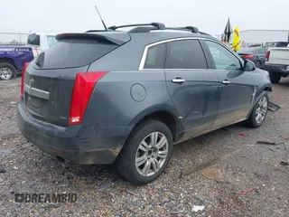 2012 Cadillac SRX with VIN 3GYFNGE31CS640832, listed as a IAAI auction lot 41861023 with 152,138 mi miles. Bid and sale history available at carsss.com. Image 4.