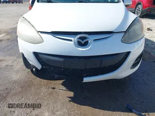 2014 Mazda 2 Sport with VIN JM1DE1KY0E0175562, listed as a IAAI auction lot 42023803 with 247,411 mi miles and . Bid and sale history available at carsss.com. Image 6.