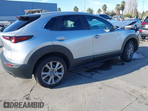 2021 Mazda CX-30 Select with VIN 3MVDMABL9MM256321, listed as a IAAI auction lot 41057613 with Not Provided miles and . Bid and sale history available at DreamBid. Image 4.