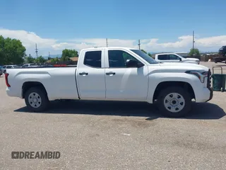 2022 Toyota Tundra with VIN 5TFKB5CDXNX001458, listed as a IAAI auction lot 42640278 with 51,718 mi miles and . Bid and sale history available at DreamBid. Image 13.