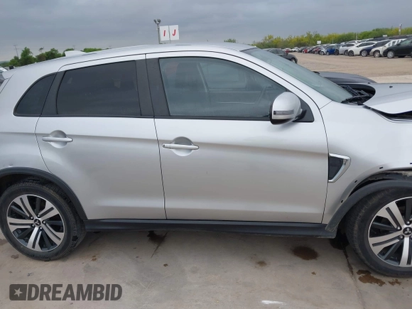 2021 Mitsubishi Outlander SE z VIN JA4APVAU7MU015876, wystawiony jako IAAI lot #42033891 z przebiegiem 86 846 mil mil oraz . Historia ofert i sprzedaży dostępna na DreamBid. Obrazek 13.
