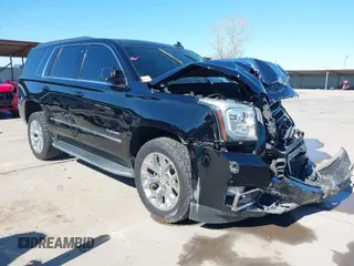 2016 GMC Yukon SLT with VIN 1GKS1BKC3GR167374, listed as a IAAI auction lot 41634253 with 145,270 mi miles. Bid and sale history available at carsss.com. Image 1.