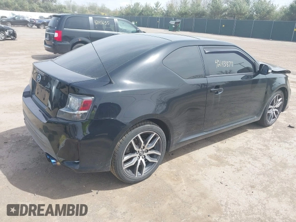 2015 Scion tC z VIN JTKJF5C75FJ012021, wystawiony jako IAAI lot #42143878 z przebiegiem 127 235 mil mil oraz . Historia ofert i sprzedaży dostępna na DreamBid. Obrazek 4.