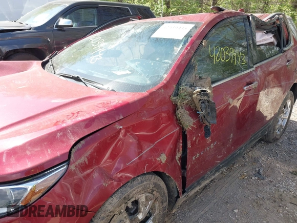 2021 Chevrolet Equinox Premier z VIN 2GNAXNEV7M6140889, wystawiony jako IAAI lot #42039443 z przebiegiem 101 767 mil mil oraz . Historia ofert i sprzedaży dostępna na DreamBid. Obrazek 14.
