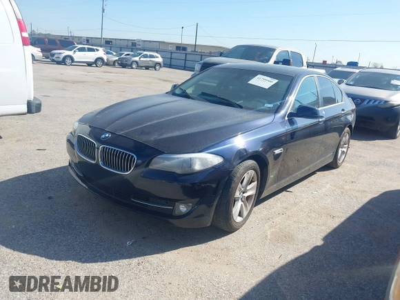 2013 BMW 5 Series 528i with VIN WBAXG5C56DD232046, listed as a IAAI auction lot 41799500 with 114,811 mi miles and . Bid and sale history available at carsss.com. Image 2.