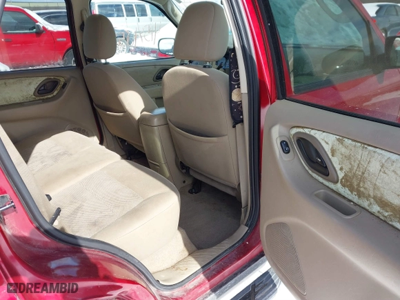 2005 Ford Escape XLT with VIN 1FMYU931X5KD99667, listed as a IAAI auction lot 41591057 with 69,595 mi miles. Bid and sale history available at carsss.com. Image 8.