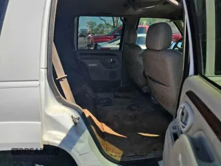 2000 Cadillac Escalade z VIN 1GYEK63R3YR218285, wystawiony jako Copart lot #82063084 z przebiegiem 190 444 mil mil oraz Tytuł czysty. Historia ofert i sprzedaży dostępna na DreamBid. Obrazek 6.