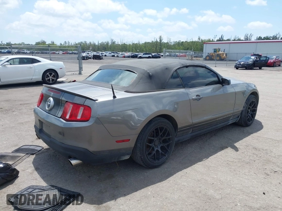 2010 Ford Mustang V6 with VIN 1ZVBP8EN1A5178265, listed as a IAAI auction lot 42107186 with 143,556 mi miles. Bid and sale history available at carsss.com. Image 4.