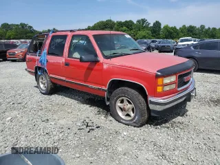 1999 GMC Yukon with VIN 1GKEK13R5XJ700234, listed as a Copart auction lot 55885584 with 163,129 mi miles and Salvage Title. Bid and sale history available at carsss.com. Image 4.